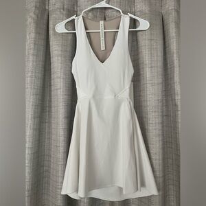 Lululemon tennis dress. V neck, cut out back, built in sports bra.